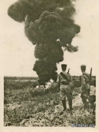 1937 - Palestine policemen watching a fire